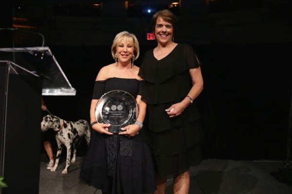 NEW YORK, NY - JUNE 09: Honoree/London Jewelers President Candy Udell and President/CEO of Bideawee Nancy Taylor speak onstage during the Bideawee Masquerade Ball at Gotham Hall on June 9, 2014 in New York City. (Photo by Neilson Barnard/Getty Images for Bideawee)